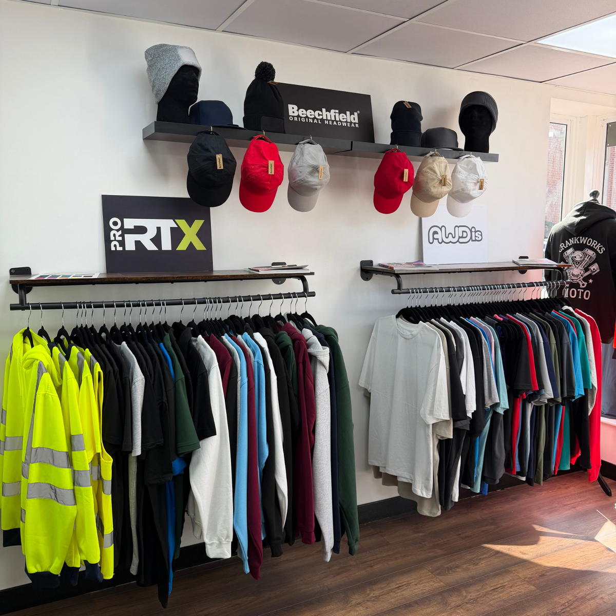 TIX Printing Stafford showroom with custom workwear, T-shirts, hi-vis clothing, caps and branded headwear